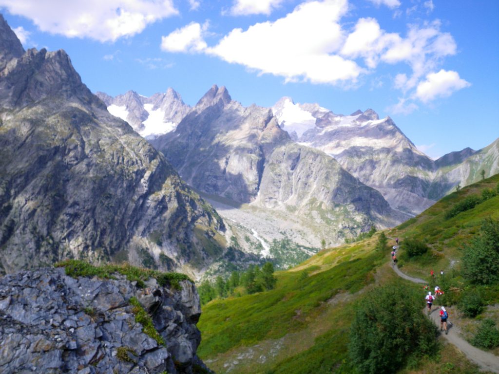 Runners on a mountain trail during the UTMB